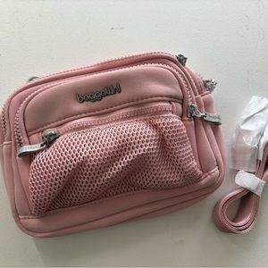 Pink baggalini - triple zip in blush neoprine.